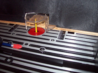 Modification of router table to support tall bit